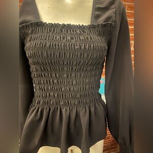 Sold sold sold .Elegant Black Smocked Women's Top